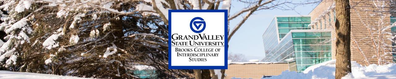 Lake Ontario Hall in the snow, with the GVSU Brooks College logo